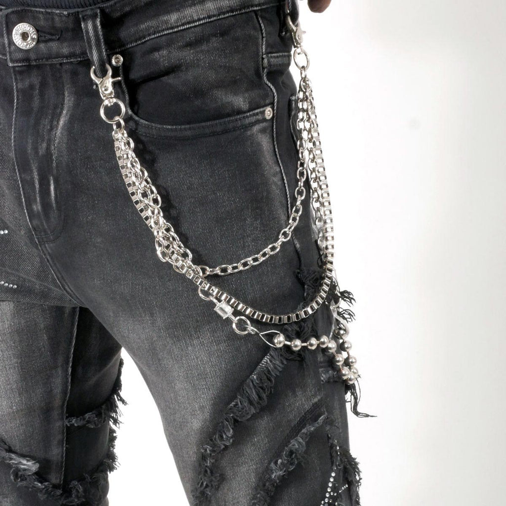 Stack denim pant w/ studded spider webs