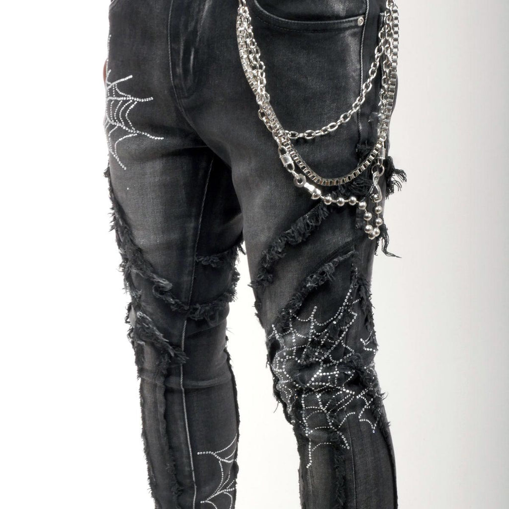 Stack denim pant w/ studded spider webs