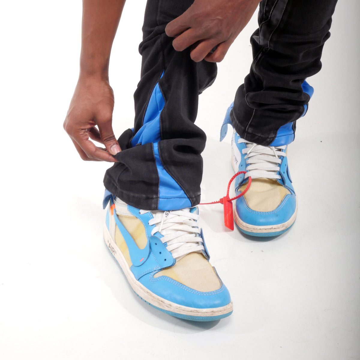 Stack denim w/ leather cut & sew details