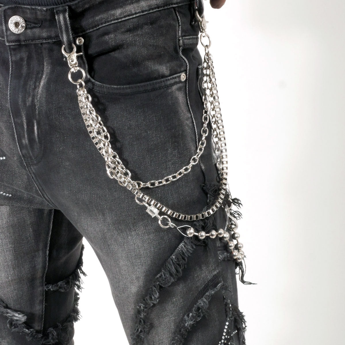 Stack denim pant w/ studded spider webs