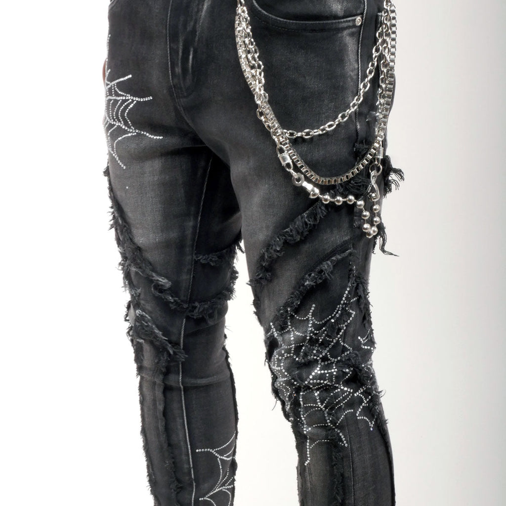 Stack denim pant w/ studded spider webs
